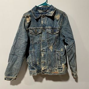 Distressed Denim Jacket.